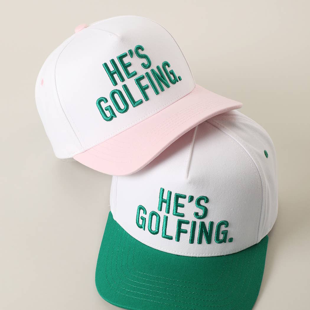 HE'S GOLFING Hat