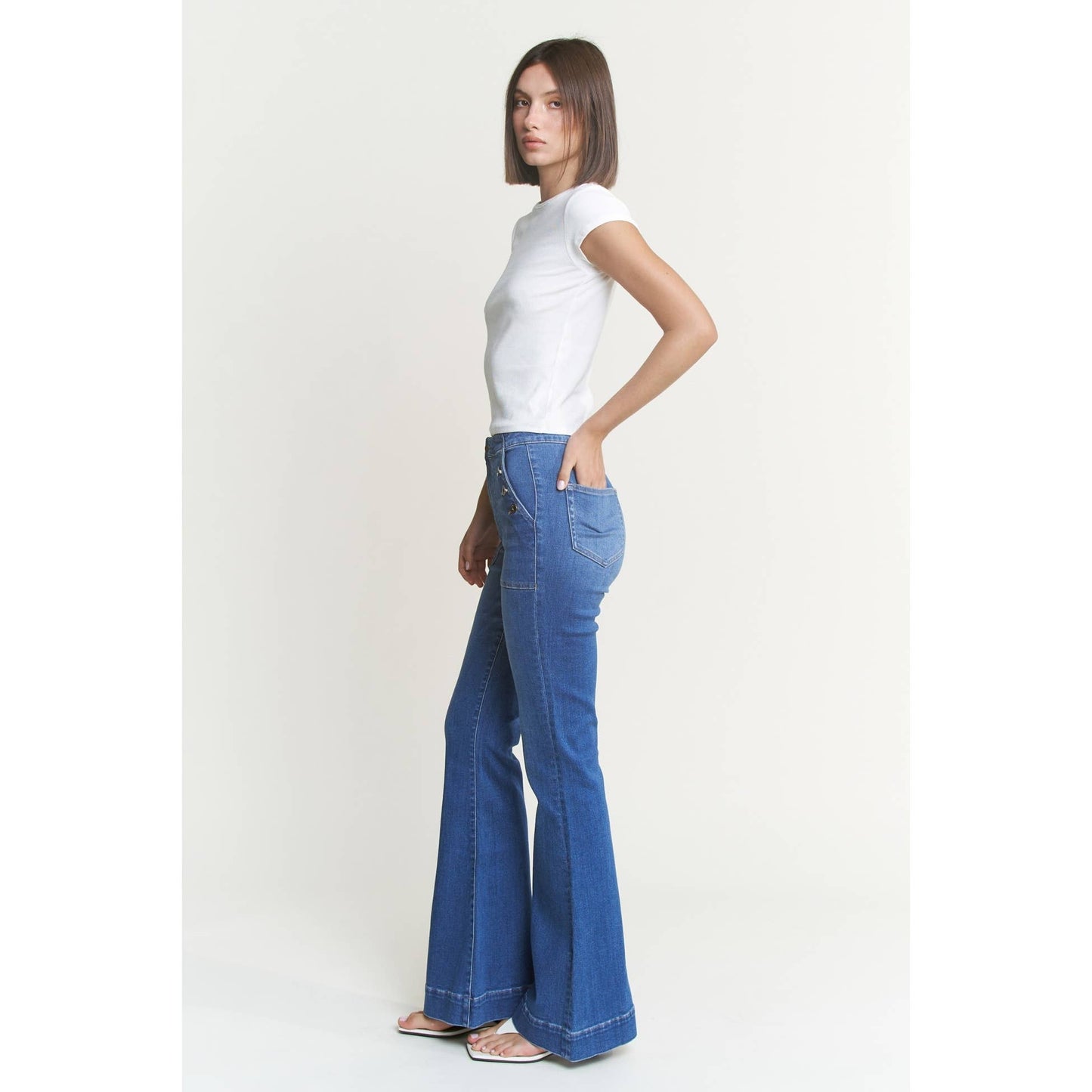 HIGH RISE FLARE WITH BUTTON PATCH POCKET