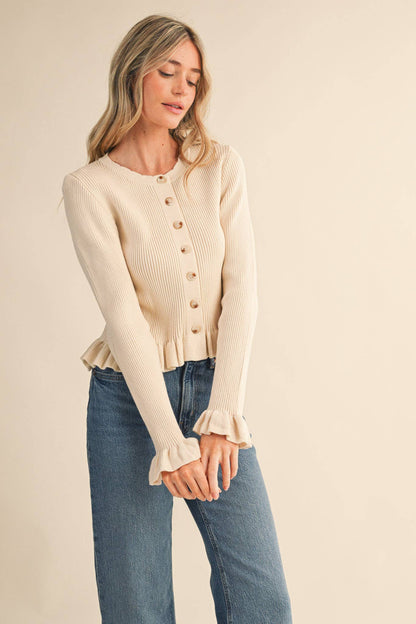 RUFFLE HEM SWEATER