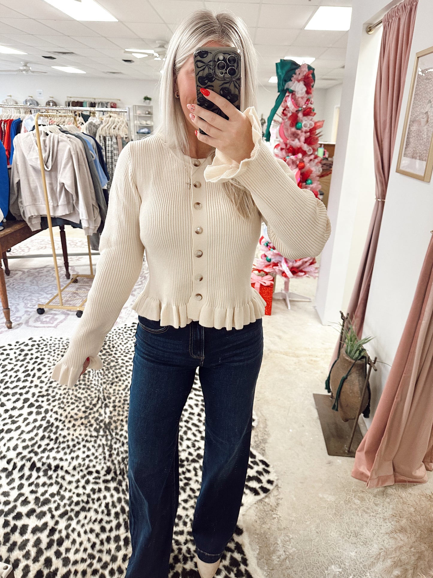 RUFFLE HEM SWEATER