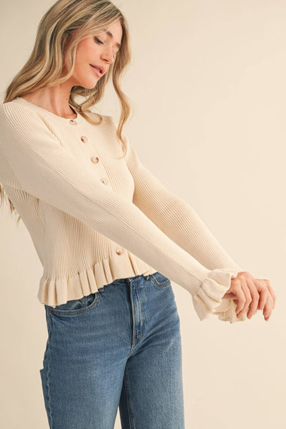 RUFFLE HEM SWEATER